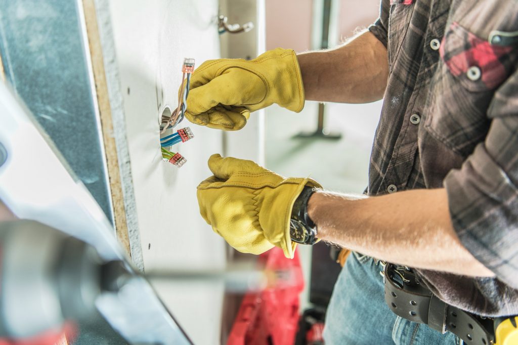 Electrician Installing Outlet